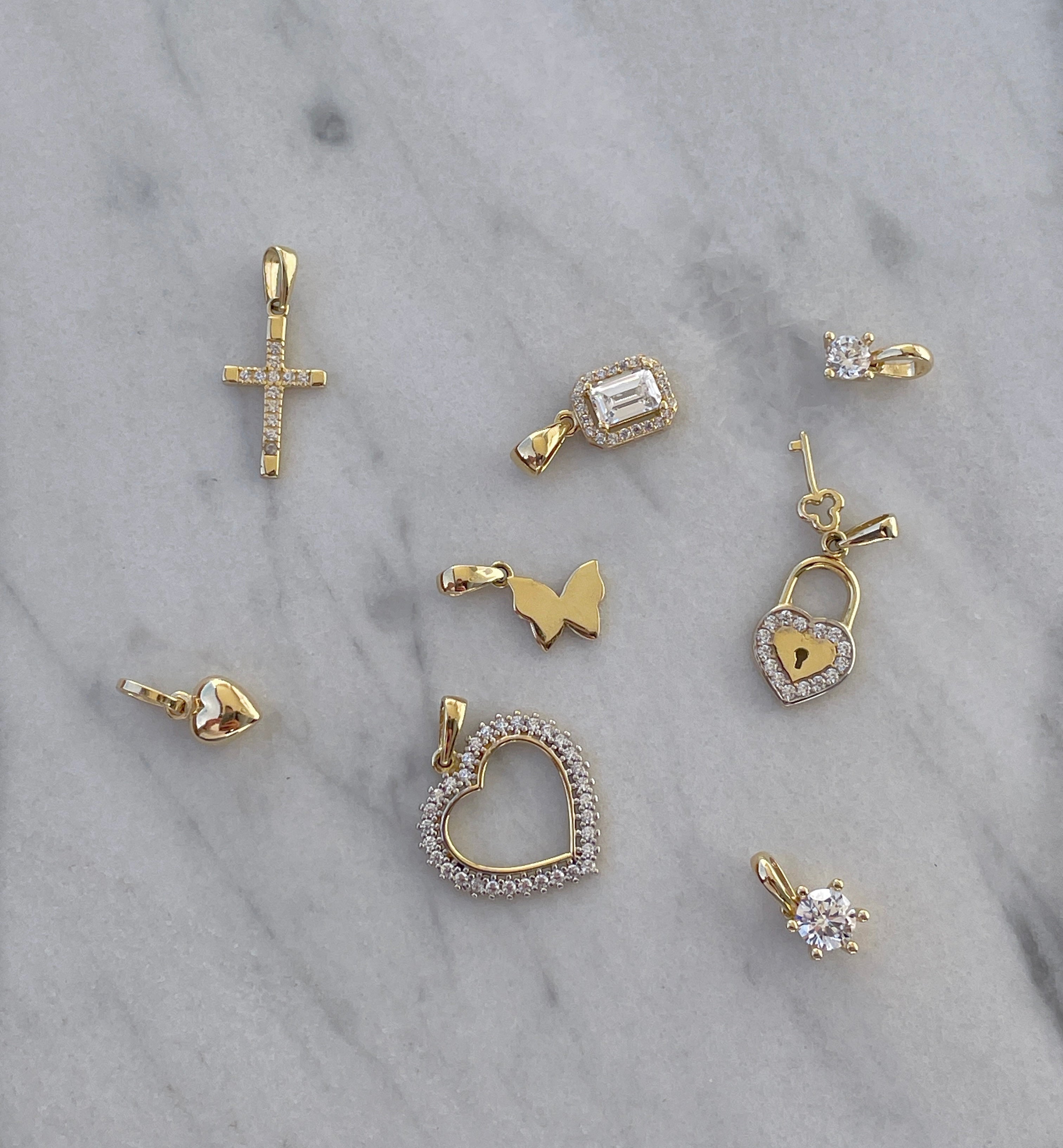 Kollektion unserer 14 Karat Gold Anhänger besetzt mit Zirkonia Steinen
