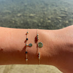 Kugel Armband mit schwarzen und goldenen Perlen aus 14 Karat Gelbgold